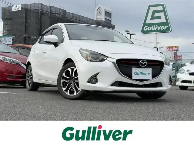 マツダ デミオ XD ツーリング Lパッケージ 大分県 2014(平26)年 9.3万km スノーフレイクホワイトパールマイカ ・マツダコネクト(CD/DVD/SD/USB)/・バックカメラ/・ヘッドアップディスプレイ/・クルーズコントロール/・ETC/・オートライト/・MTモード付きAT/・スマートキー/・プッシュスタートボタン/・オートエアコン/・アイドリングストップ/・フロアマット