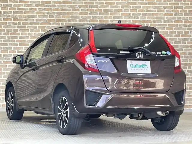 ホンダ フィット 13G FパックコンフォートED 道央・札幌 2016(平28)年 12.7万km プレミアムディープモカパール ４WD/横滑り防止装置/アイドリングストップ/ヘッドライトレベライザー/シートヒーター/純正ナビ/バックカメラ/ワンセグTV/ステアリングスイッチ/ETC/熱線入りフロントウインドウ/ヒーテッドドアミラー/チップアップリヤシート/ドアバイザー/１５インチアルミホイール/純正フロアマット
