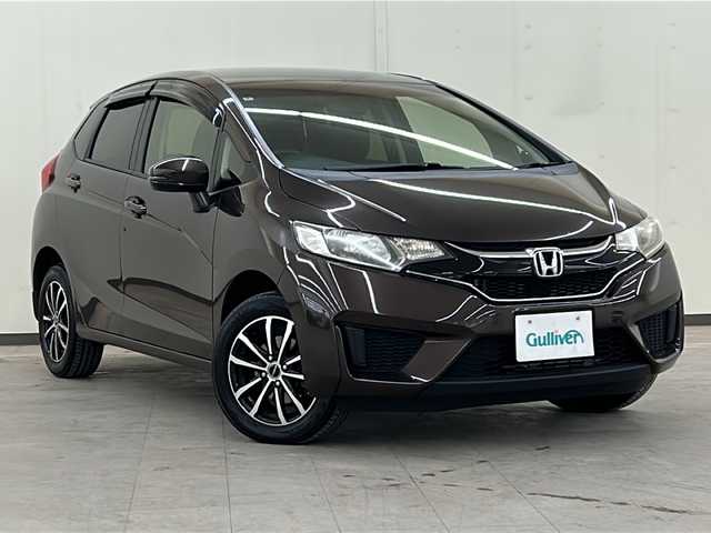 ホンダ フィット 13G FパックコンフォートED 道央・札幌 2016(平28)年 12.7万km プレミアムディープモカパール ４WD/横滑り防止装置/アイドリングストップ/ヘッドライトレベライザー/シートヒーター/純正ナビ/バックカメラ/ワンセグTV/ステアリングスイッチ/ETC/熱線入りフロントウインドウ/ヒーテッドドアミラー/チップアップリヤシート/ドアバイザー/１５インチアルミホイール/純正フロアマット