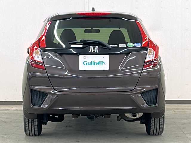 ホンダ フィット 13G FパックコンフォートED 道央・札幌 2016(平28)年 12.7万km プレミアムディープモカパール ４WD/横滑り防止装置/アイドリングストップ/ヘッドライトレベライザー/シートヒーター/純正ナビ/バックカメラ/ワンセグTV/ステアリングスイッチ/ETC/熱線入りフロントウインドウ/ヒーテッドドアミラー/チップアップリヤシート/ドアバイザー/１５インチアルミホイール/純正フロアマット