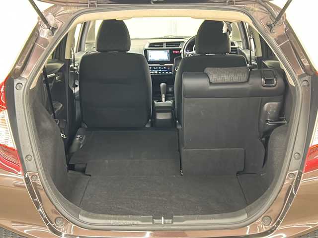 ホンダ フィット 13G FパックコンフォートED 道央・札幌 2016(平28)年 12.7万km プレミアムディープモカパール ４WD/横滑り防止装置/アイドリングストップ/ヘッドライトレベライザー/シートヒーター/純正ナビ/バックカメラ/ワンセグTV/ステアリングスイッチ/ETC/熱線入りフロントウインドウ/ヒーテッドドアミラー/チップアップリヤシート/ドアバイザー/１５インチアルミホイール/純正フロアマット