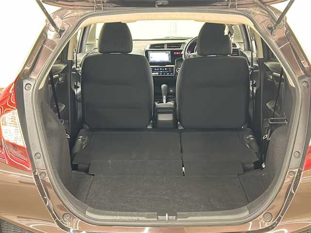 ホンダ フィット 13G FパックコンフォートED 道央・札幌 2016(平28)年 12.7万km プレミアムディープモカパール ４WD/横滑り防止装置/アイドリングストップ/ヘッドライトレベライザー/シートヒーター/純正ナビ/バックカメラ/ワンセグTV/ステアリングスイッチ/ETC/熱線入りフロントウインドウ/ヒーテッドドアミラー/チップアップリヤシート/ドアバイザー/１５インチアルミホイール/純正フロアマット