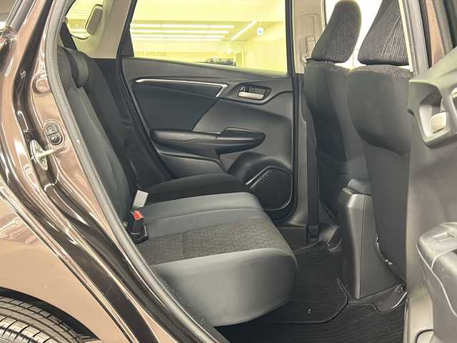 ホンダ フィット 13G FパックコンフォートED 道央・札幌 2016(平28)年 12.7万km プレミアムディープモカパール ４WD/横滑り防止装置/アイドリングストップ/ヘッドライトレベライザー/シートヒーター/純正ナビ/バックカメラ/ワンセグTV/ステアリングスイッチ/ETC/熱線入りフロントウインドウ/ヒーテッドドアミラー/チップアップリヤシート/ドアバイザー/１５インチアルミホイール/純正フロアマット