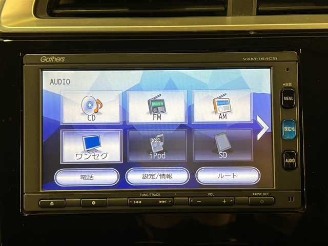 ホンダ フィット 13G FパックコンフォートED 道央・札幌 2016(平28)年 12.7万km プレミアムディープモカパール ４WD/横滑り防止装置/アイドリングストップ/ヘッドライトレベライザー/シートヒーター/純正ナビ/バックカメラ/ワンセグTV/ステアリングスイッチ/ETC/熱線入りフロントウインドウ/ヒーテッドドアミラー/チップアップリヤシート/ドアバイザー/１５インチアルミホイール/純正フロアマット