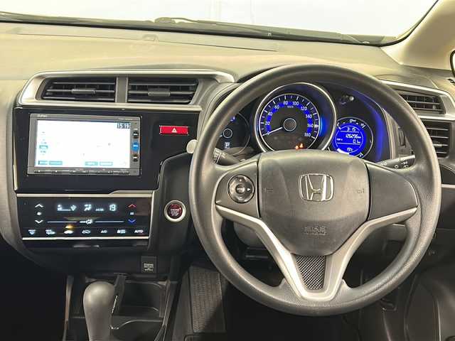 ホンダ フィット 13G FパックコンフォートED 道央・札幌 2016(平28)年 12.7万km プレミアムディープモカパール ４WD/横滑り防止装置/アイドリングストップ/ヘッドライトレベライザー/シートヒーター/純正ナビ/バックカメラ/ワンセグTV/ステアリングスイッチ/ETC/熱線入りフロントウインドウ/ヒーテッドドアミラー/チップアップリヤシート/ドアバイザー/１５インチアルミホイール/純正フロアマット