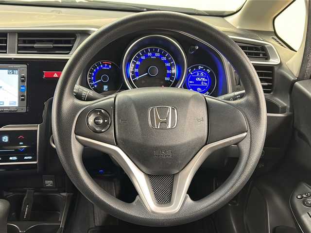 ホンダ フィット 13G FパックコンフォートED 道央・札幌 2016(平28)年 12.7万km プレミアムディープモカパール ４WD/横滑り防止装置/アイドリングストップ/ヘッドライトレベライザー/シートヒーター/純正ナビ/バックカメラ/ワンセグTV/ステアリングスイッチ/ETC/熱線入りフロントウインドウ/ヒーテッドドアミラー/チップアップリヤシート/ドアバイザー/１５インチアルミホイール/純正フロアマット