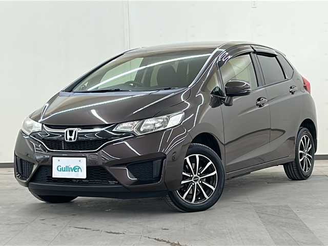 ホンダ フィット 13G FパックコンフォートED 道央・札幌 2016(平28)年 12.7万km プレミアムディープモカパール ４WD/横滑り防止装置/アイドリングストップ/ヘッドライトレベライザー/シートヒーター/純正ナビ/バックカメラ/ワンセグTV/ステアリングスイッチ/ETC/熱線入りフロントウインドウ/ヒーテッドドアミラー/チップアップリヤシート/ドアバイザー/１５インチアルミホイール/純正フロアマット