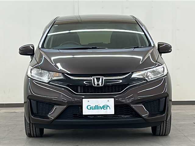ホンダ フィット 13G FパックコンフォートED 道央・札幌 2016(平28)年 12.7万km プレミアムディープモカパール ４WD/横滑り防止装置/アイドリングストップ/ヘッドライトレベライザー/シートヒーター/純正ナビ/バックカメラ/ワンセグTV/ステアリングスイッチ/ETC/熱線入りフロントウインドウ/ヒーテッドドアミラー/チップアップリヤシート/ドアバイザー/１５インチアルミホイール/純正フロアマット