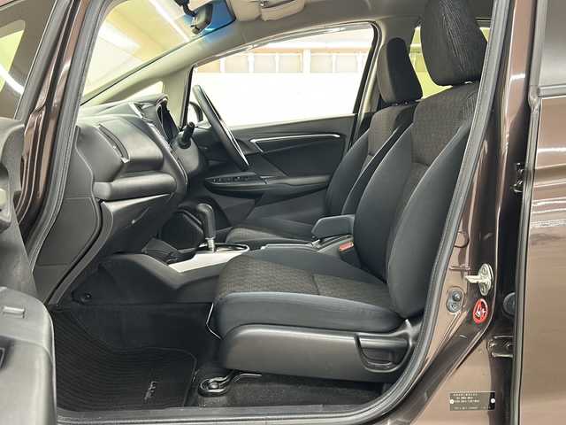 ホンダ フィット 13G FパックコンフォートED 道央・札幌 2016(平28)年 12.7万km プレミアムディープモカパール ４WD/横滑り防止装置/アイドリングストップ/ヘッドライトレベライザー/シートヒーター/純正ナビ/バックカメラ/ワンセグTV/ステアリングスイッチ/ETC/熱線入りフロントウインドウ/ヒーテッドドアミラー/チップアップリヤシート/ドアバイザー/１５インチアルミホイール/純正フロアマット