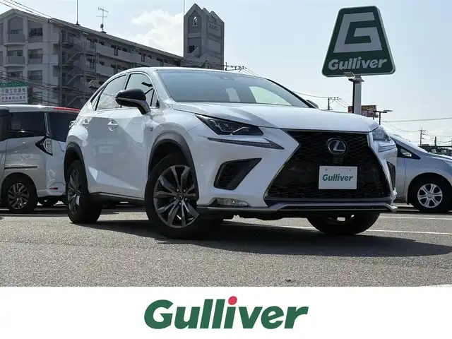 レクサス ＮＸ 300 Fスポーツ 大分県 2018(平30)年 7万km ホワイトノーヴァガラスフレーク ・純正ナビ(CD/DVD/SD/BT/USB/AUX/Miracast)/・フルセグテレビ/・バックモニター/・赤黒レザーシート/・ムーンルーフ/・三眼LEDヘッドライト/・プリクラッシュセーフティ/・ETC 2.0/・ドライブレコーダー/・レーダークルーズコントロール/・ステアリングリモコン/・ステアリングヒーター/・オートハイビーム/・パドルシフト/・パワーシート/・シートメモリー/・シートヒーター/・シートクーラー/・ブレーキホールド/・電動リアゲート