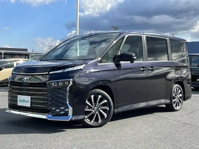 トヨタ ヴォクシー S－Z 奈良県 2023(令5)年 1.1万km スパークリングブラックパールクリスタルシャイン 純正10.5インチディスプレイオーディオ/(TV/BT/AppleCarPlay/AndroidAuto)/純正14インチフリップダウンモニター（V14T-R72R）/レーダークルーズコントロール/バックカメラ/ブラインドスポットモニター/前後コーナーセンサー/プリクラッシュセーフティ/レーンキープアシスト/両側パワースライドドア/パワーバックドア/ハーフレザーシート/全席シートヒーター/ヘッドアップディスプレイ/後席サンシェード/LEDヘッドライト/ETC2.0/純正17インチAW/保証書/取り扱い説明書/スペアキーX1