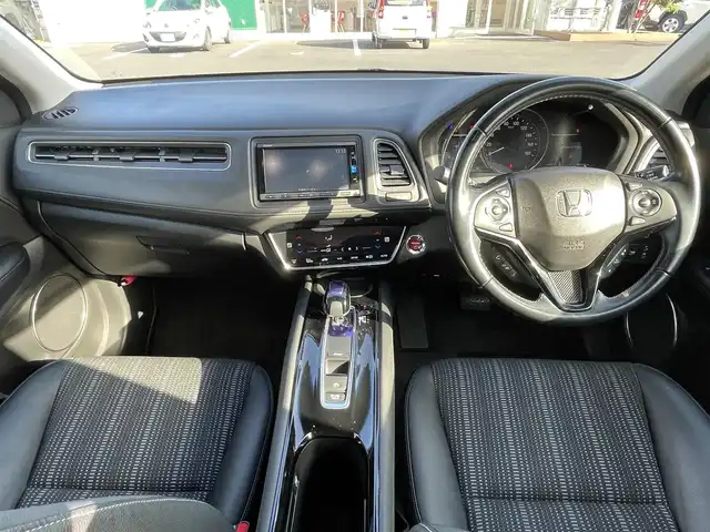 ホンダ ヴェゼル ハイブリッド Z ホンダセンシング 島根県 2016(平28)年 6.3万km ルーセブラックM 純正ＳＤナビ　/フルセグTV　/ＤＶＤ再生　/Ｂｌｕｅｔｏｏｔｈ接続　/バックカメラ　/ビルトインＥＴＣ　/ドライブレコーダー　/アダプティブクルーズコントロール/衝突軽減システム　/前席シートヒーター　/スマートキー/純正ＬＥＤヘッドライト/純正１７インチアルミホイール　/純正フロアマット　/保証書/取扱説明書/スペアキー1本