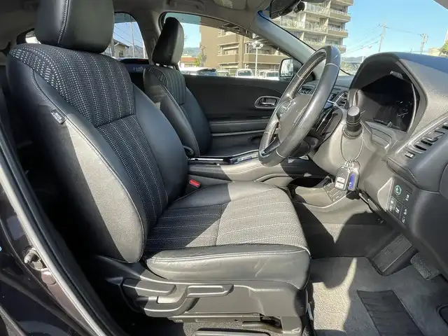 ホンダ ヴェゼル ハイブリッド Z ホンダセンシング 島根県 2016(平28)年 6.3万km ルーセブラックM 純正ＳＤナビ　/フルセグTV　/ＤＶＤ再生　/Ｂｌｕｅｔｏｏｔｈ接続　/バックカメラ　/ビルトインＥＴＣ　/ドライブレコーダー　/アダプティブクルーズコントロール/衝突軽減システム　/前席シートヒーター　/スマートキー/純正ＬＥＤヘッドライト/純正１７インチアルミホイール　/純正フロアマット　/保証書/取扱説明書/スペアキー1本