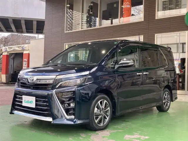 トヨタ ヴォクシー ZS 煌Ⅲ 神奈川県 2021(令3)年 2.8万km ブラッキッシュアゲハガラスフレーク 新車保証書/スマートキー/スペアキー/純正SDナビ・フルセグTV/CD・DVDビデオ・Bluetooth/バックカメラ/ビルトインETC2.0/両側パワースライドドア/トヨタセーフティセンス/・プリクラッシュセーフティシステム/・レーンディパーチャーアラート/・オートマチックハイビーム/・先行車発進告知機能/インテリジェントクリアランスソナー/クルーズコントロール/LEDヘッドライト/LEDフォグランプ/純正フロアーマット/純正ドアバイザー