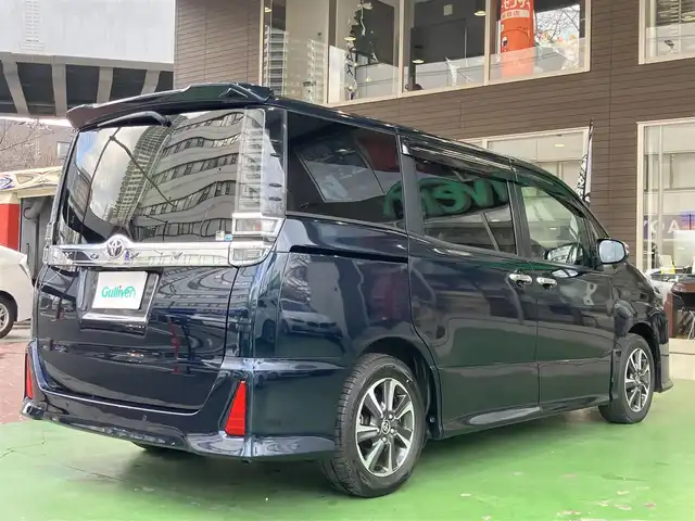トヨタ ヴォクシー ZS 煌Ⅲ 神奈川県 2021(令3)年 2.8万km ブラッキッシュアゲハガラスフレーク 新車保証書/スマートキー/スペアキー/純正SDナビ・フルセグTV/CD・DVDビデオ・Bluetooth/バックカメラ/ビルトインETC2.0/両側パワースライドドア/トヨタセーフティセンス/・プリクラッシュセーフティシステム/・レーンディパーチャーアラート/・オートマチックハイビーム/・先行車発進告知機能/インテリジェントクリアランスソナー/クルーズコントロール/LEDヘッドライト/LEDフォグランプ/純正フロアーマット/純正ドアバイザー