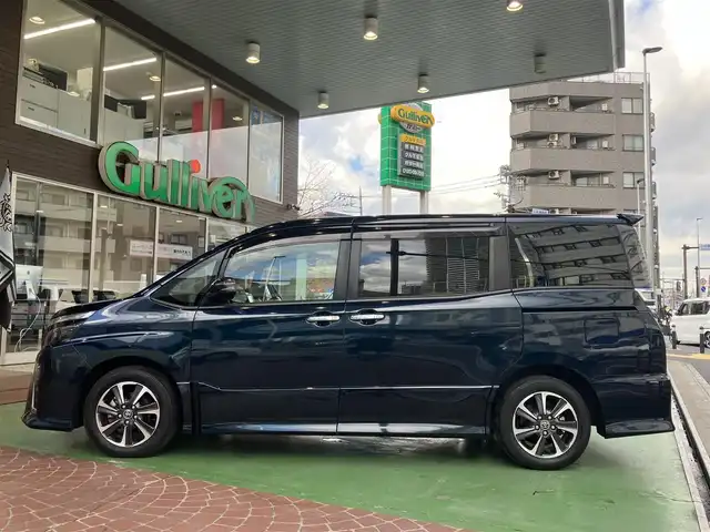 トヨタ ヴォクシー ZS 煌Ⅲ 神奈川県 2021(令3)年 2.8万km ブラッキッシュアゲハガラスフレーク 新車保証書/スマートキー/スペアキー/純正SDナビ・フルセグTV/CD・DVDビデオ・Bluetooth/バックカメラ/ビルトインETC2.0/両側パワースライドドア/トヨタセーフティセンス/・プリクラッシュセーフティシステム/・レーンディパーチャーアラート/・オートマチックハイビーム/・先行車発進告知機能/インテリジェントクリアランスソナー/クルーズコントロール/LEDヘッドライト/LEDフォグランプ/純正フロアーマット/純正ドアバイザー