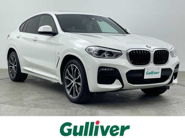 ＢＭＷ Ｘ４ xDrive 30i Mスポーツ 大分県 2020(令2)年 2.7万km アルピンホワイトⅢ 4WD/サンルーフ/インテリジェントセーフティ/・ブレーキ機能付き歩行者警告/・衝突回避アシスト/・Cityブレーキ機能付き歩行者警告/・レーンディパーチャウォーニング/・レーンチェンジウォーニング/・側方衝突警告/・優先通行警告/アクティブクルーズコントール（ACC）/ヘッドアップディスプレイ（HUD）/コンフォートアクセス/ハンズフリー付きテールゲート/ミラー一体型ETC/パーキングアシスト/置くだけ充電/純正ドライブレコーダー（前後）/360°ビューモニター/純正HDDナビ/【フルセグTV、BT対応、USB、AM/FM】/ステアリングスイッチ/パドルシフト/茶革シート/・運転席2メモリーシート/・前席パワーシート/・前席シートヒーター/アイドリングストップ/電動格納ミラー/フロアマット/オートライト/LEDヘッドライト/LEDフォグランプ/コーナーセンサー/純正20インチアルミホイール/保証書、取説、スペアキー有り