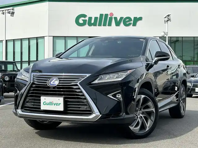 レクサス ＲＸ 450h バージョンL 愛媛県 2016(平28)年 10.7万km グラファイトブラックガラスフレーク 登録時走行距離：106256Km/純正メーカーOPメモリナビ/CD/DVD/BD/TV/BT/AM/FM/純正ビルトインETC2.0/全周囲カメラ/サンルーフ/カーテンエアバッグ/シートメモリー/レザーシート/パワーシート/全席シートヒーター/D+Nエアシート/電動セカンドシート/電動チルトステアリング/ステアリングヒーター/追従クルコン/横滑り防止装置/盗難防止装置/衝突軽減システム/前後コーナーセンサー/LEDヘッドライト/LEDフォグランプ/オートライト/オートハイビーム/フォグランプ/エンジンスタートボタン/スマートキー/純正アルミホイール/純正フロアマット