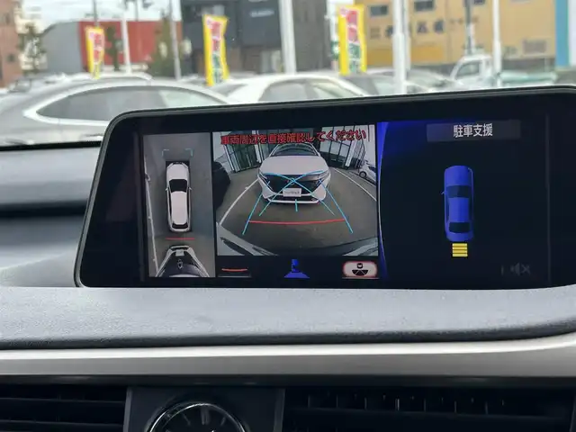 レクサス ＲＸ 450h バージョンL 愛媛県 2016(平28)年 10.7万km グラファイトブラックガラスフレーク 登録時走行距離：106256Km/純正メーカーOPメモリナビ/CD/DVD/BD/TV/BT/AM/FM/純正ビルトインETC2.0/全周囲カメラ/サンルーフ/カーテンエアバッグ/シートメモリー/レザーシート/パワーシート/全席シートヒーター/D+Nエアシート/電動セカンドシート/電動チルトステアリング/ステアリングヒーター/追従クルコン/横滑り防止装置/盗難防止装置/衝突軽減システム/前後コーナーセンサー/LEDヘッドライト/LEDフォグランプ/オートライト/オートハイビーム/フォグランプ/エンジンスタートボタン/スマートキー/純正アルミホイール/純正フロアマット