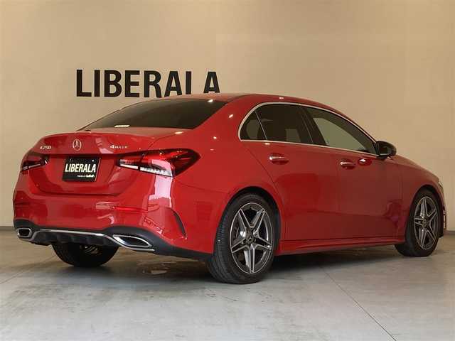 メルセデス・ベンツ Ｍ・ベンツ Ａ２５０ 4MATIC AMGライン 熊本県 2020(令2)年 0.9万km ジュピターレッド ・スマートキー/・プッシュスタート/・サンルーフ/・アクティブステアリングアシスト/・道路標識アシスト/・アクティブレーンキーピングアシスト/・アクティブブレーキアシスト/・アテンションアシスト/・ブラインドスポットモニター/・レーンチェンジアシスト/・インテリジェントライトシステム/・クルーズコントロール(追従式)/・ハーフレザーシート/・前席パワーシート/・前席シートヒーター /・純正メモリナビ/　【Bluetooth・USB・AppleCarPlay・AndroidAuto】/・フルセグTV/・バックカメラ/・ETC2.0/・LEDヘッドランプ/・純正マット