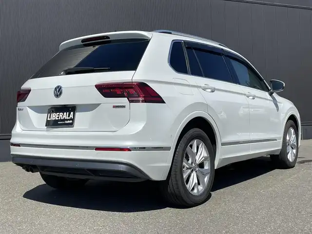 フォルクスワーゲン ティグアン TDI 4モーション ハイライン 道東・釧路十勝 2018(平30)年 5.2万km オリックスホワイトパールエフェクト ４WD/純正ナビ/CD/DVD/SD/フルセグ/AppleCarPlay/AndroidAudio/全方位モニター/ETC２．０/同一車線内全車速運転支援システム/アダクティブクルーズコントロール/アダクティブシャシーコントロール/レーンキープアシストシステム/レーンチェンジアシストシステム/プリクラッシュブレーキシステム/レザーシート/パワーシート（運転席）/全席シートヒーター/電動リアゲート/純正AW　18インチ/純正フロアマット/スペアキー