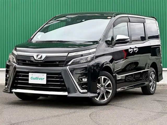 トヨタ ヴォクシー ZS 煌Ⅱ 宮城県 2019(平31)年 5万km ブラック 純正ナビ/(フルセグTV/CD/SD/BT)/バックカメラ/プリクラッシュセーフティー/レーンディパーチャーアラート/クリアランスソナー/先行車発進告知/クルーズコントロール/パーキングサポートブレーキ/オートハイビーム/ドライブレコーダー前後/ビルトインETC/デュアルオートエアコン/MTモード付AT/ドライブセレクト/革巻きステアリング/ステアリングスイッチ/オートライト/アイドリングストップ/両側パワースライドドア/ふらつき防止/プッシュスタート＆スマートキー/ウインカー付き電動格納ミラー/ドアバイザー/フロアマット/キャンセラー/LEDヘッドライト/フォグランプ/純正16インチAW