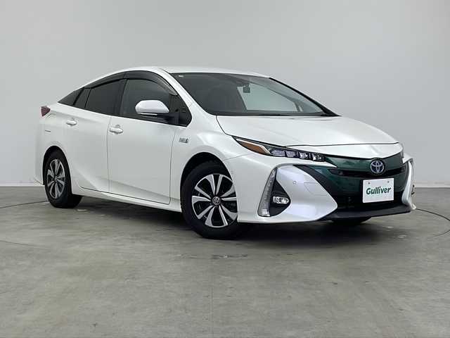 トヨタ プリウス ＰＨＶ Sナビパケ・セーフティプラス 新潟県 2018(平30)年 5.4万km ホワイトパールクリスタルシャイン 寒冷地仕様/11.6インチナビ/ USB/AUX/BT/フルセグ/バックカメラ/PCS/ICS/ACC/クリアランスソナー /オートハイビーム/LEDヘッドライト/フォグライト/バックフォグ/ステアリングヒーター/前席シートヒーター /パーキングアシスト/ビルトインETC2.0/前後ドライブレコーダー/スマートキー一体型エンジンスターター /オートリトラミラー /ミラーヒーター/フロントデアイサー/純正フロアマット/純正AWサマータイヤ積み込み