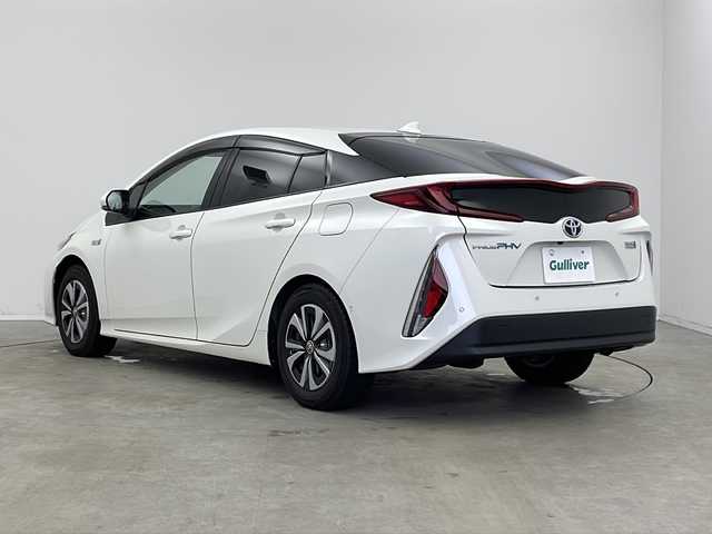 トヨタ プリウス ＰＨＶ Sナビパケ・セーフティプラス 新潟県 2018(平30)年 5.4万km ホワイトパールクリスタルシャイン 寒冷地仕様/11.6インチナビ/ USB/AUX/BT/フルセグ/バックカメラ/PCS/ICS/ACC/クリアランスソナー /オートハイビーム/LEDヘッドライト/フォグライト/バックフォグ/ステアリングヒーター/前席シートヒーター /パーキングアシスト/ビルトインETC2.0/前後ドライブレコーダー/スマートキー一体型エンジンスターター /オートリトラミラー /ミラーヒーター/フロントデアイサー/純正フロアマット/純正AWサマータイヤ積み込み