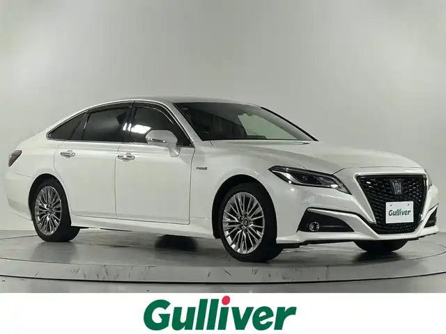 トヨタ クラウン ハイブリッド S エレガンススタイル 佐賀県 2019(令1)年 1.7万km ホワイトパールクリスタルシャイン 純正8インチナビ/フルセグTV/CD/DVD/Bluetooth/バックカメラ/衝突被害軽減システム/ブラインドスポットモニター/レーダークルーズコントロール/クリアランスソナー/レーンアシスト/ロードサインアシスト/オートライト/オートマチックハイビーム/電子パーキング/オートブレーキホールド/前方ドライブレコーダー/LEDヘッドライト/LEDフォグライト/ハーフレザーシート/純正フロアマット/運転席・助手席パワーシート/スマートキー/ステアリングスイッチ