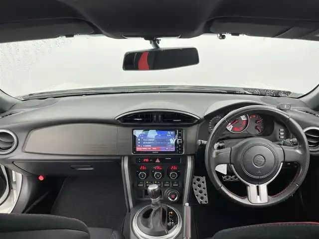 トヨタ ８６ GT 大分県 2015(平27)年 2.7万km クリスタルホワイトパール 社外ナビ/（フルセグ/CD/DVD/Bluetooth）/モデリスタエアロ/クスコタワーバー/パドルシフト/走行モード切替/（SNOW/sports）/クリアランスソナー/バックカメラ　/ETC/オートライト/オートエアコン/社外アルミホイール/プッシュスタート・スマートキー/保証書・取扱説明書/スペアキー