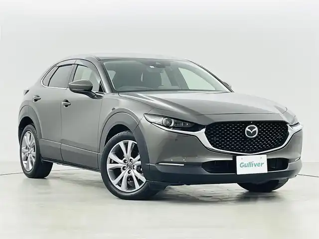 マツダ ＣＸ－３０ XD プロアクティブツーリングセレクション 福島県 2020(令2)年 2.9万km チタニウムフラッシュマイカ 純正SDナビゲーション/【CD/DVD/Bluetooth/フルセグTV】/・BOSEスピーカー/・360°ビューモニター/・ETC/・前後ドライブレコーダー/スマートブレーキサポート/AT誤発進抑制制御/レーダークルーズコントロール/前後パーキングセンサー/車線逸脱警報/レーンキープアシスト/ブラインドスポットモニタリング/コーナーセンサー/LEDヘッドライト/・オートライト/・アダプティブヘッドライト/パワーテールゲート/ハーフレザーシート/・運転席パワーシート/・ポジションメモリー/・運転席＋助手席シートヒーター/ステアリングヒーター/・ステアリングスイッチ/アイドリングストップ/純正18インチアルミホイール/純正フロアマット/ドアバイザー/プッシュスタート/・スマートキー/・スペアキー