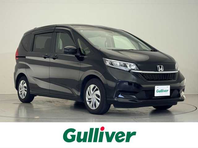 ホンダ フリード G 滋賀県 2023(令5)年 2.5万km クリスタルブラックパール 禁煙車/純正ナビ/CD/Bluetooth/FM/AM/バックカメラ/ホンダセンシング/・CMBS(衝突軽減ブレーキ)/・歩行者事故低減ステアリング/・アダプティブクルーズコントロール/・LKAS(車線維持支援システム)/・路外逸脱抑制機能/・誤発進抑制機能/・先行車発進お知らせ機能/・標識認識機能/・マルチインフォメーションディスプレイ/ETC/両側パワースライドドア/D/N席シートヒーター /ドライブレコーダー/LEDヘッドライト/オートライト/ステアリングスイッチ/ドアバイザー/プッシュスタート /スマートキー/スペアキー/純正フロアマット