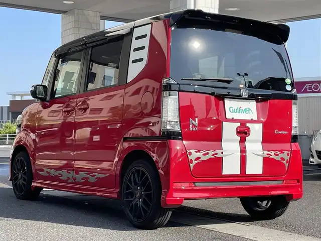 ホンダ Ｎ ＢＯＸ 2トーン カスタム ターボSSパッケージ 岡山県 2014(平26)年 8.2万km ミラノレッド 登録時走行距離81191キロ/社外SDナビ/AM/FM/Bluetooth/TV/CD/DVD/SD/無限エアロ/CTBA（シティブレーキアクティブシステム）/クルーズコントロール/バックカメラ/両側パワースライドドア/無限フロアマット/社外16インチAW/HIDヘッドライト/スマートキー/プッシュスタート/ETC