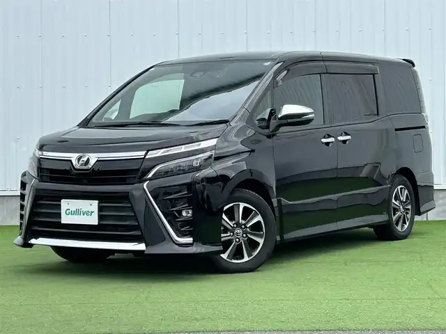 トヨタ ヴォクシー ZS 煌 香川県 2019(平31)年 2.5万km ブラック 登録時走行距離：24178km/社外１１インチナビ　/フルセグＴＶ　/社外フリップダウン　/ＥＴＣ　/ドラレコ　/両パワスラ/バックカメラ　/クルコン　/コーナーセンサー　/ＬＥＤヘッドライト　/オートライト　/横滑り防止　/スマートキー　/プッシュスタート