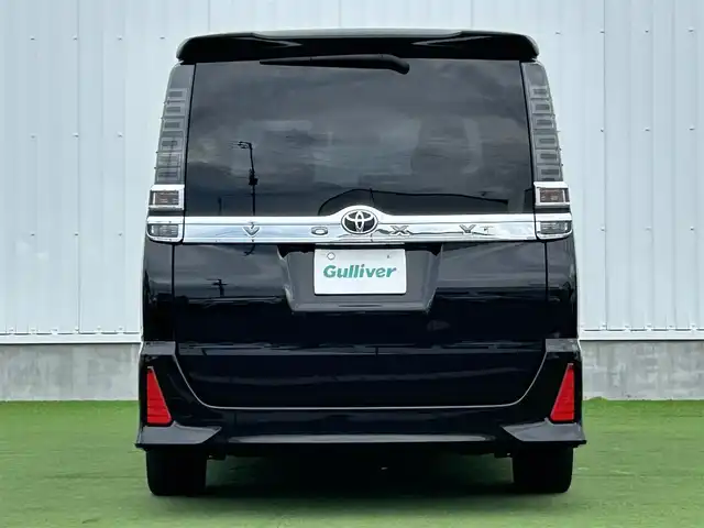 トヨタ ヴォクシー ZS 煌 香川県 2019(平31)年 2.5万km ブラック 登録時走行距離：24178km/社外１１インチナビ　/フルセグＴＶ　/社外フリップダウン　/ＥＴＣ　/ドラレコ　/両パワスラ/バックカメラ　/クルコン　/コーナーセンサー　/ＬＥＤヘッドライト　/オートライト　/横滑り防止　/スマートキー　/プッシュスタート