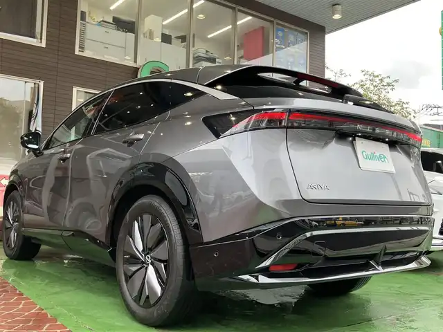 日産 アリア B6 神奈川県 2022(令4)年 1.4万km ダークメタルグレー 純正ナビ/・AM/FM/HDMI/BT/・AppleCarPlay/AndroidAuto/・フルセグTV/全周囲カメラ/・フロント/バック/サイド/プロパイロット2.0/衝突防止支援/踏み間違い防止支援/後側方車両検知支援/後側方車両衝突防止支援/車両逸脱警報/車両逸脱防止支援/駐車支援/オートマチックハイビーム/純正革巻きステアリング/・ステアリングスイッチ/レザーシート/・D/N席パワーシート/・D/N席シートヒーター/・全席シートヒーター/オートライト/・LEDライト/・フォグランプ/デジタルインナーミラー/電動アームレスト/サンルーフ/ETC2.0/BOSEプレミアムサウンド/前後ドライブレコーダー/電動格納ミラー/・ウィンカーミラー/e-pedal/置くだけ充電/電動サイドブレーキ/・オートホールドボタン/パワーバックドア/純正ドアバイザー/純正アルミホイール/純正フロアマット/スマートキー/・スペアキー