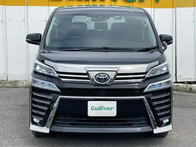 トヨタ ヴェルファイア ハイブリット ZR Gエディション 山口県 2020(令2)年 4.2万km スパークリングブラックパールクリスタルシャイン 外部検査済み/ワンオーナー/4WD/AppleCarPlay/純正メモリナビ/ （DVD/フルセグTV/Bluetooth/USB）/バックカメラ/ビルトインETC2.0/前後ドライブレコーダー/デジタルインナーミラー/後席フリップダウンモニター/両側パワースライドドア/レザーシート/前席・2列目パワーシート/前席シートヒーター/前席エアシート/パワーバックドア/ステアリングヒーター/リアサンシェード/TOYOTA Safety Sense/・レーダークルーズ コントロール/・プリクラッシュセーフティ/・レーントレーシングアシスト/・レーンディパーチャーアラート/・ロードサインアシスト/・先行車発進告知機能/・オートマチックハイビーム/ブラインドスポットモニター/パーキングサポートブレーキ/リアクロストラフィックアラート/横滑り防止機能/スマートキー/純正17インチアルミホイール/純正LEDヘッドライト/カーテンエアバック/スペアキー1本/保証書/取扱説明書