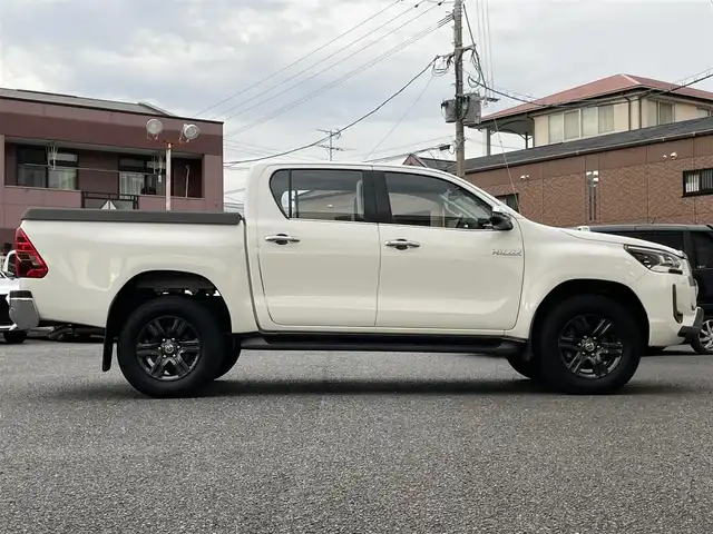 トヨタ ハイラックス Z 福岡県 2022(令4)年 2.5万km スーパーホワイトⅡ ワンオーナー/4WD/純正メモリナビ【NSZT-W68T】/　(AM/FM/CD/DVD/Bluetooth/フルセグTV)/バックカメラ/運転支援装置/・プリクラッシュセーフティ/・レーンディパーチャーアラート/・ロードサインアシスト/・レーダークルーズコントロール/・先行車発進告知/・クリアランスソナー/・リヤデフロック/・ダウンヒルアシストコントロールシステム/荷台トノカバー/パワーヒーター/排出ガス浄化/純正17インチアルミホイール/革巻きステアリング/ステアリングスイッチ/純正フロアマット/純正ETC/スペアタイヤ/アクセサリーソケット/ISOFIX/スペアキー×2(鍵のみ)/保証書/取扱説明書/ナビ取扱説明書