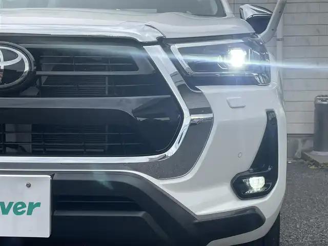 トヨタ ハイラックス Z 福岡県 2022(令4)年 2.5万km スーパーホワイトⅡ ワンオーナー/4WD/純正メモリナビ【NSZT-W68T】/　(AM/FM/CD/DVD/Bluetooth/フルセグTV)/バックカメラ/運転支援装置/・プリクラッシュセーフティ/・レーンディパーチャーアラート/・ロードサインアシスト/・レーダークルーズコントロール/・先行車発進告知/・クリアランスソナー/・リヤデフロック/・ダウンヒルアシストコントロールシステム/荷台トノカバー/パワーヒーター/排出ガス浄化/純正17インチアルミホイール/革巻きステアリング/ステアリングスイッチ/純正フロアマット/純正ETC/スペアタイヤ/アクセサリーソケット/ISOFIX/スペアキー×2(鍵のみ)/保証書/取扱説明書/ナビ取扱説明書