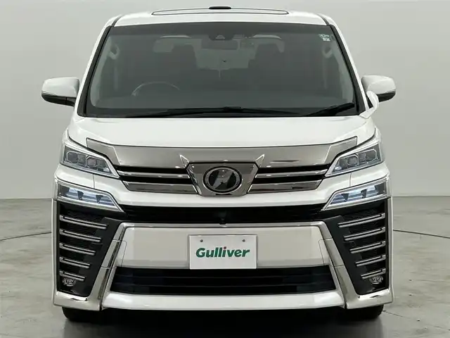 トヨタ ヴェルファイア Z Aエディション 福岡県 2019(平31)年 5.7万km ホワイトパールクリスタルシャイン サンルーフ　/後席モニター　/社外ナビ（ＢＴ，フルセグＴＶ）　/バックカメラ　/ＥＴＣ　/前後ドラレコ　/ＡＣＣ　/コーナーセンサー　/衝突軽減ブレーキ　/レーンキープ　/両側電動スライドドア　/パワーバックドア　/ＬＥＤ