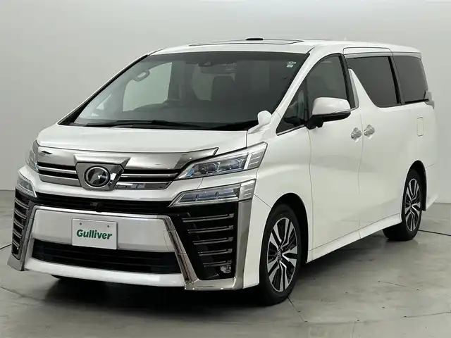 トヨタ ヴェルファイア Z Aエディション 福岡県 2019(平31)年 5.7万km ホワイトパールクリスタルシャイン サンルーフ　/後席モニター　/社外ナビ（ＢＴ，フルセグＴＶ）　/バックカメラ　/ＥＴＣ　/前後ドラレコ　/ＡＣＣ　/コーナーセンサー　/衝突軽減ブレーキ　/レーンキープ　/両側電動スライドドア　/パワーバックドア　/ＬＥＤ