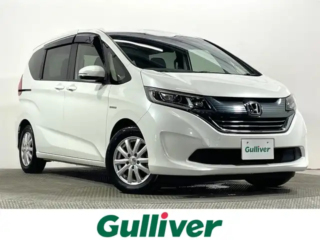 ホンダ フリード ハイブリット G ホンダセンシング 大阪府 2017(平29)年 3.7万km ホワイトオーキッドパール 社外ナビTV バックカメラ レーダークルコン 衝突軽減ブレーキ レーンアシスト スマートキー プッシュスタート オートライト 両側パワースライドドア ドライブレコーダー ETC