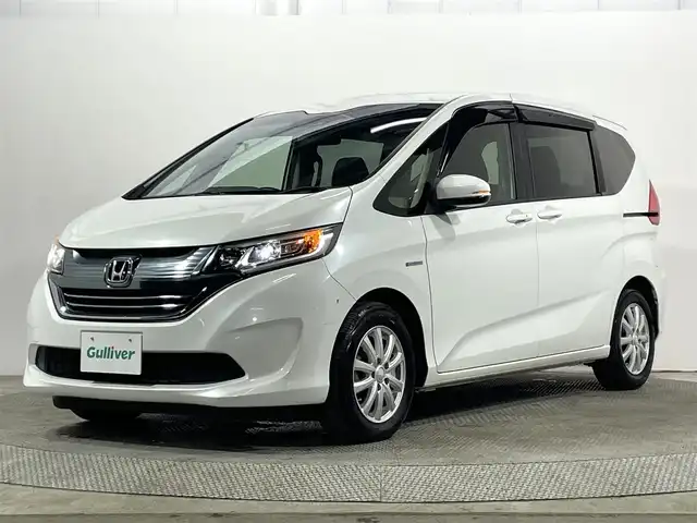 ホンダ フリード ハイブリット G ホンダセンシング 大阪府 2017(平29)年 3.7万km ホワイトオーキッドパール 社外ナビTV バックカメラ レーダークルコン 衝突軽減ブレーキ レーンアシスト スマートキー プッシュスタート オートライト 両側パワースライドドア ドライブレコーダー ETC