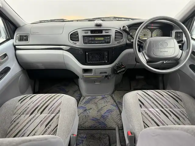 トヨタ ハイエース レジアス ウインドツアラー 愛知県 1997(平9)年 13.2万km ブルーイッシュシルバーM 対面シート/ツインサンルーフ/ルーフレール/カーテン/純正OPナビ/ドラレコ/WAC/ECT/電格ミラー/ドアバイザー/ハロゲンヘッドライト/フォグランプ/純正アルミホイール/純正フロアマット