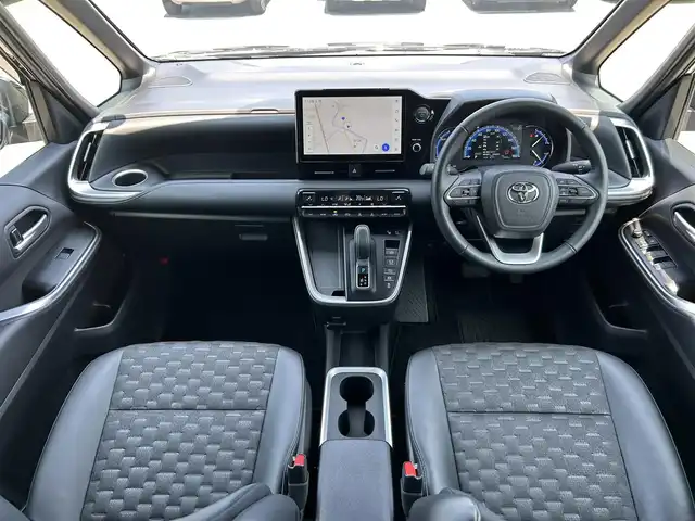 トヨタ ヴォクシー ハイブリッド S－Z 愛媛県 2023(令5)年 1.5万km アティチュードブラックマイカ １０．５型純正ナビ　１４型有機ＥＬフリップダウンモニタ　３６０°カメラ　３眼ＬＥＤヘッドライト　電動パーキングブレーキ　両側電動スライド　シートヒーター　１００Ｖ電源　　ＥＴＣ２．０　パーキングアシスト DVD再生