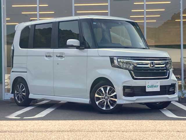 ホンダ Ｎ ＢＯＸ カスタム L 愛媛県 2022(令4)年 3万km プラチナホワイトパール 社外ナビ(MDV-D208BT ) /・CD Bluetooth SD USB AUX /バックカメラ /片側パワースライドドア /前方ドライブレコーダー /ETC /衝突軽減ブレーキ /レーンキープアシスト /レーダークルーズ /コーナーセンサー/オートブレーキホールド/LEDオートライト/●左右独立式リアセンターアームレスト/●コンビニフック付シートバックテーブル（運転席/助手席）/●9灯式フルLEDヘッドライト/●運転席&助手席シートヒーター/●充電用USBジャック2個口/●2列目ロールサンシェード