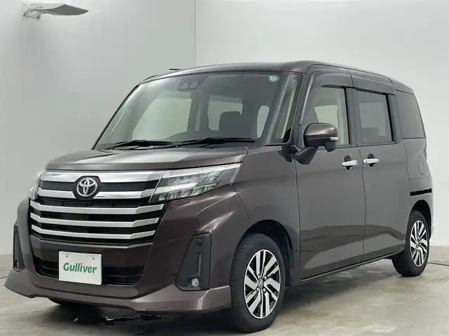 トヨタ ルーミー カスタムG 岡山県 2023(令5)年 2.3万km プラムブラウンパールクリスタルシャイン 純正９インチディスプレイオーディオ/（AMFM/BT/フルセグTV）/バックカメラ/ビルトインETC/LEDヘッドライト/LEDフォグランプ/オートライト/レーダークルーズコントロール/両側パワースライドドア/純正14インチアルミホイール/オートブレーキホールド/ISOFIX/後席サンシェイド/ステアリングスイッチ/チルトステアリング/シートリフター/ウインカーミラー/ドアバイザー/スマートキー×2/新車保証書/取扱説明書