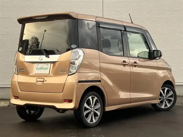 日産 デイズ ルークス ハイウェイスターターボ 秋田県 2016(平28)年 8.3万km ピンクゴールドM ４WD/ターボ/衝突軽減システム/LEDヘッドライト/純正メモリナビ（DVD/CD/BT）/フルセグ/アラウンドビューモニター/日産純正アルミ（夏タイヤ装着）/スマートキー/純正エンジンスターター/アイドリングストップ/プッシュスタート/ステアリングスイッチ/運転席シートヒーター/ETC/純正フロアマット/純正ドアバイザー/オートライト/オートエアコン/パワーステアリング/パワーウィンドウ/電動格納ウィンカーミラー/横滑り防止/盗難防止装置/寒冷地仕様/保証書/取扱説明書/記録簿/スペアキー×１