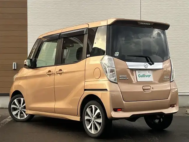 日産 デイズ ルークス ハイウェイスターターボ 秋田県 2016(平28)年 8.3万km ピンクゴールドM ４WD/ターボ/衝突軽減システム/LEDヘッドライト/純正メモリナビ（DVD/CD/BT）/フルセグ/アラウンドビューモニター/日産純正アルミ（夏タイヤ装着）/スマートキー/純正エンジンスターター/アイドリングストップ/プッシュスタート/ステアリングスイッチ/運転席シートヒーター/ETC/純正フロアマット/純正ドアバイザー/オートライト/オートエアコン/パワーステアリング/パワーウィンドウ/電動格納ウィンカーミラー/横滑り防止/盗難防止装置/寒冷地仕様/保証書/取扱説明書/記録簿/スペアキー×１