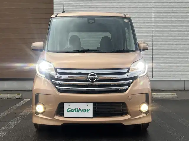 日産 デイズ ルークス ハイウェイスターターボ 秋田県 2016(平28)年 8.3万km ピンクゴールドM ４WD/ターボ/衝突軽減システム/LEDヘッドライト/純正メモリナビ（DVD/CD/BT）/フルセグ/アラウンドビューモニター/日産純正アルミ（夏タイヤ装着）/スマートキー/純正エンジンスターター/アイドリングストップ/プッシュスタート/ステアリングスイッチ/運転席シートヒーター/ETC/純正フロアマット/純正ドアバイザー/オートライト/オートエアコン/パワーステアリング/パワーウィンドウ/電動格納ウィンカーミラー/横滑り防止/盗難防止装置/寒冷地仕様/保証書/取扱説明書/記録簿/スペアキー×１